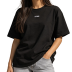 Model wearing a black LSTHRS T-shirt with embroidered chest logo
