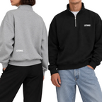 Two models wearing black and grey LSTHRS quarter-zip sweatshirts